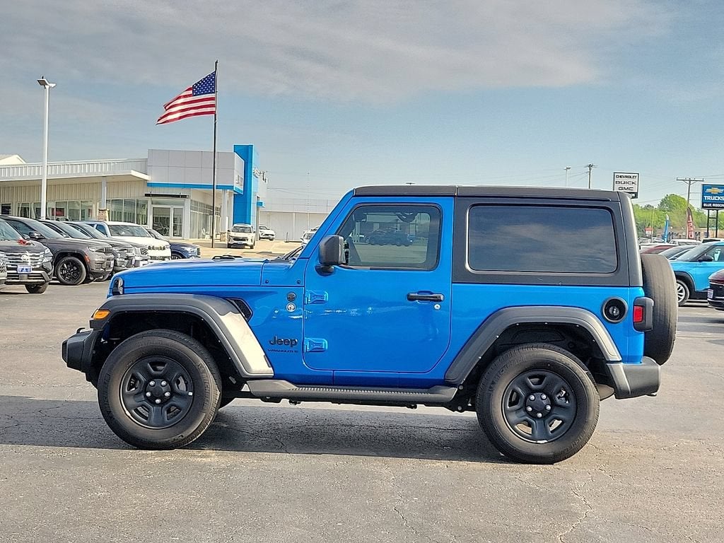 2023 Jeep Wrangler — rear three-quarter view