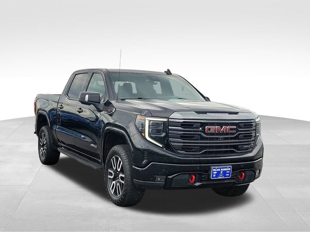 2023 GMC Sierra 1500 AT4 in Onyx Black — front three-quarter view