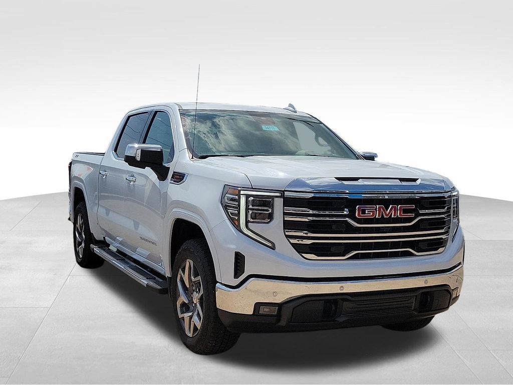 2026 GMC Sierra 1500 SLT in Glacier White Tricoat — front three-quarter view