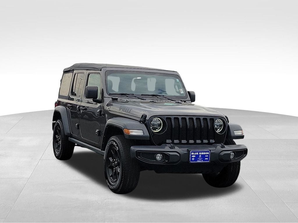 2022 Jeep Wrangler Unlimited Willys in Granite Crystal Metallic Clearcoat — front three-quarter view