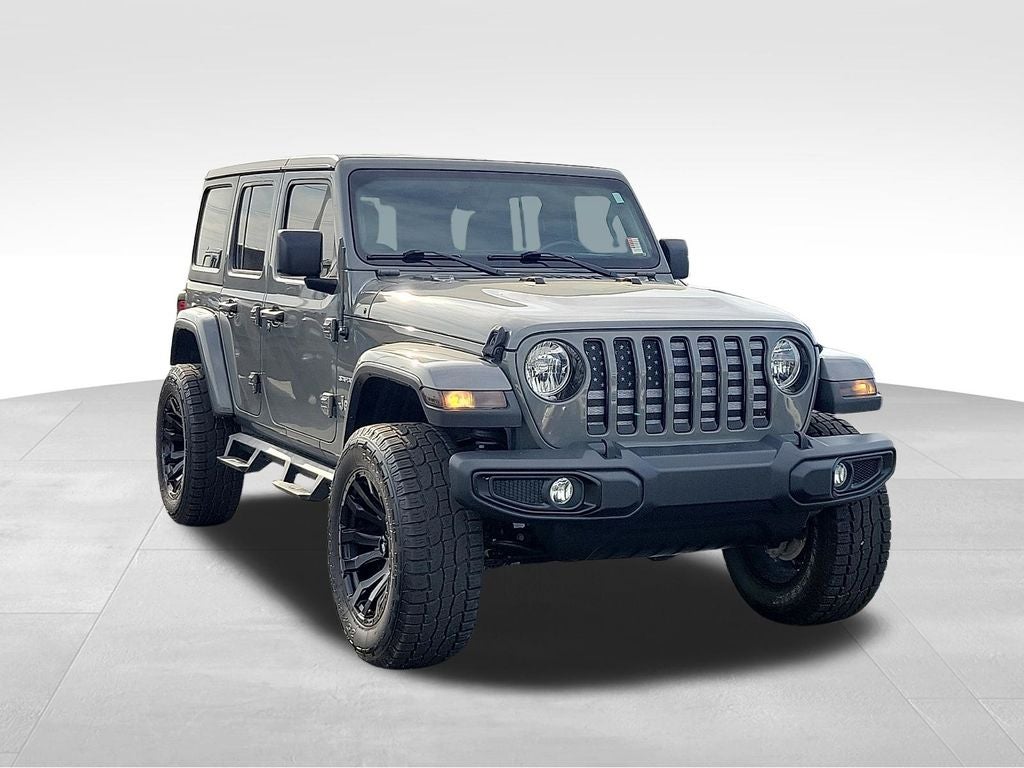 2020 Jeep Wrangler Unlimited Sahara in Sting-Gray Clearcoat — front three-quarter view
