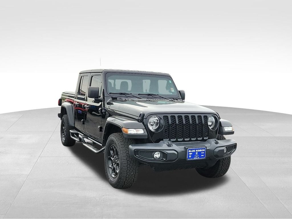 2023 Jeep Gladiator Willys in Black Clearcoat — front three-quarter view