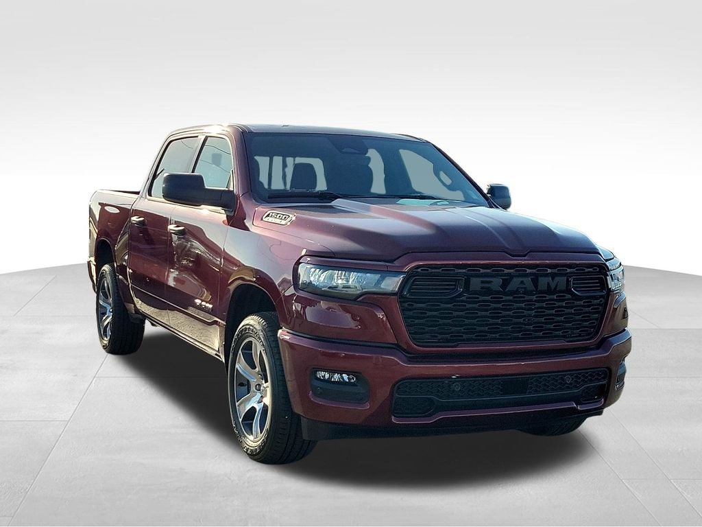 2025 RAM 1500 Tradesman in Delmonico Red Pearlcoat — front three-quarter view