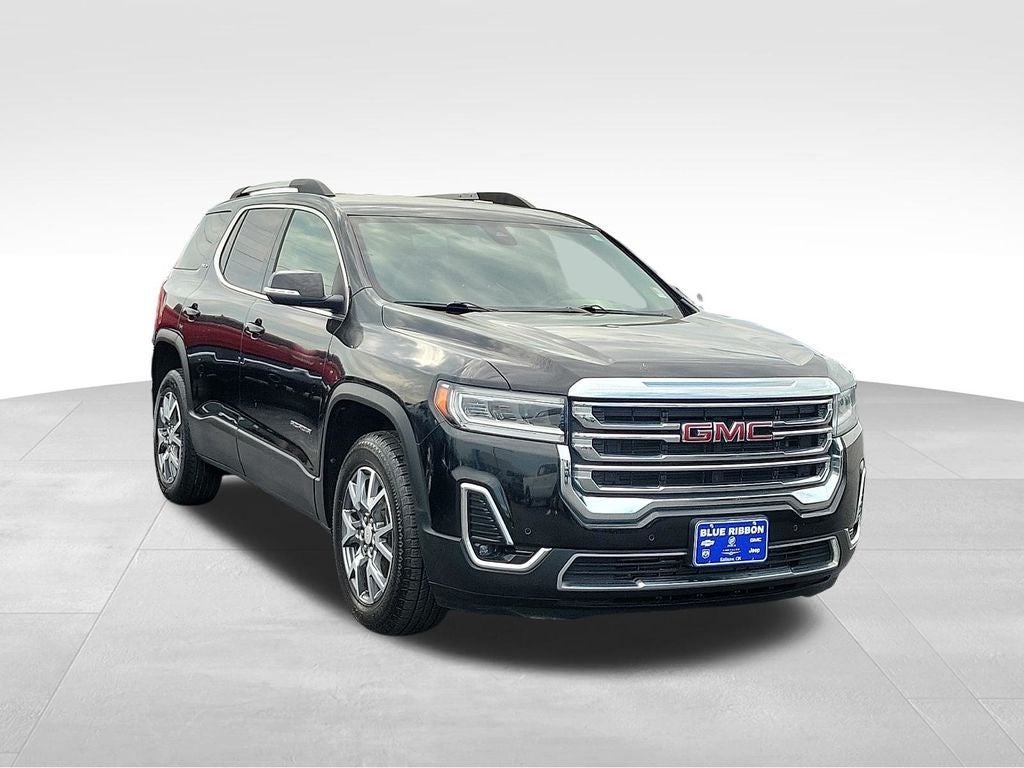 2023 GMC Acadia SLT in Ebony Twilight Metallic — front three-quarter view